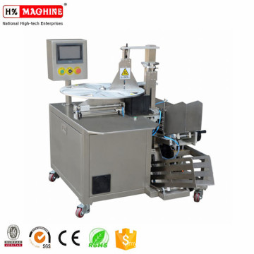 HX 101 FACIAL MASK FOLDING PACKING MACHINE WITH AUTOMATIC GROUNDS BAGS FUNCTION